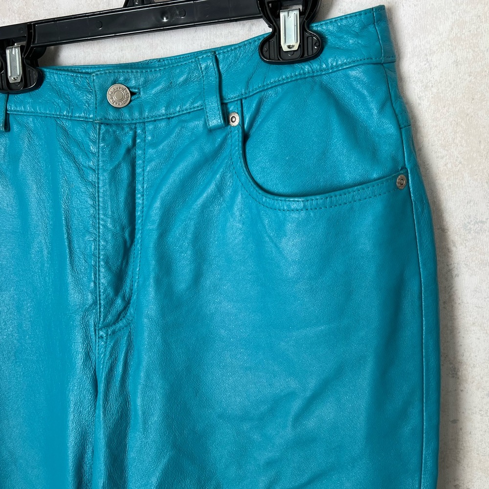 Electric blue, straight leg leather pants.